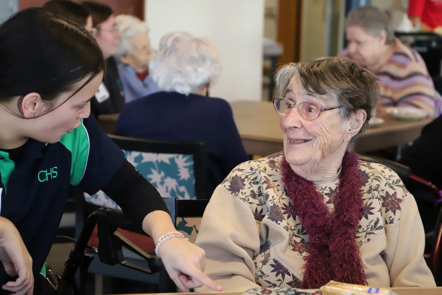 High school student chatting with Glenview resident